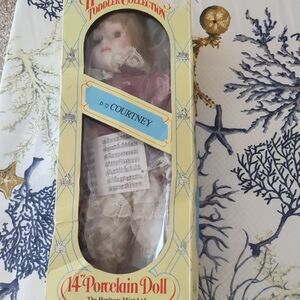 Heritage Courtney Porcelain Doll with Purple and White Dress